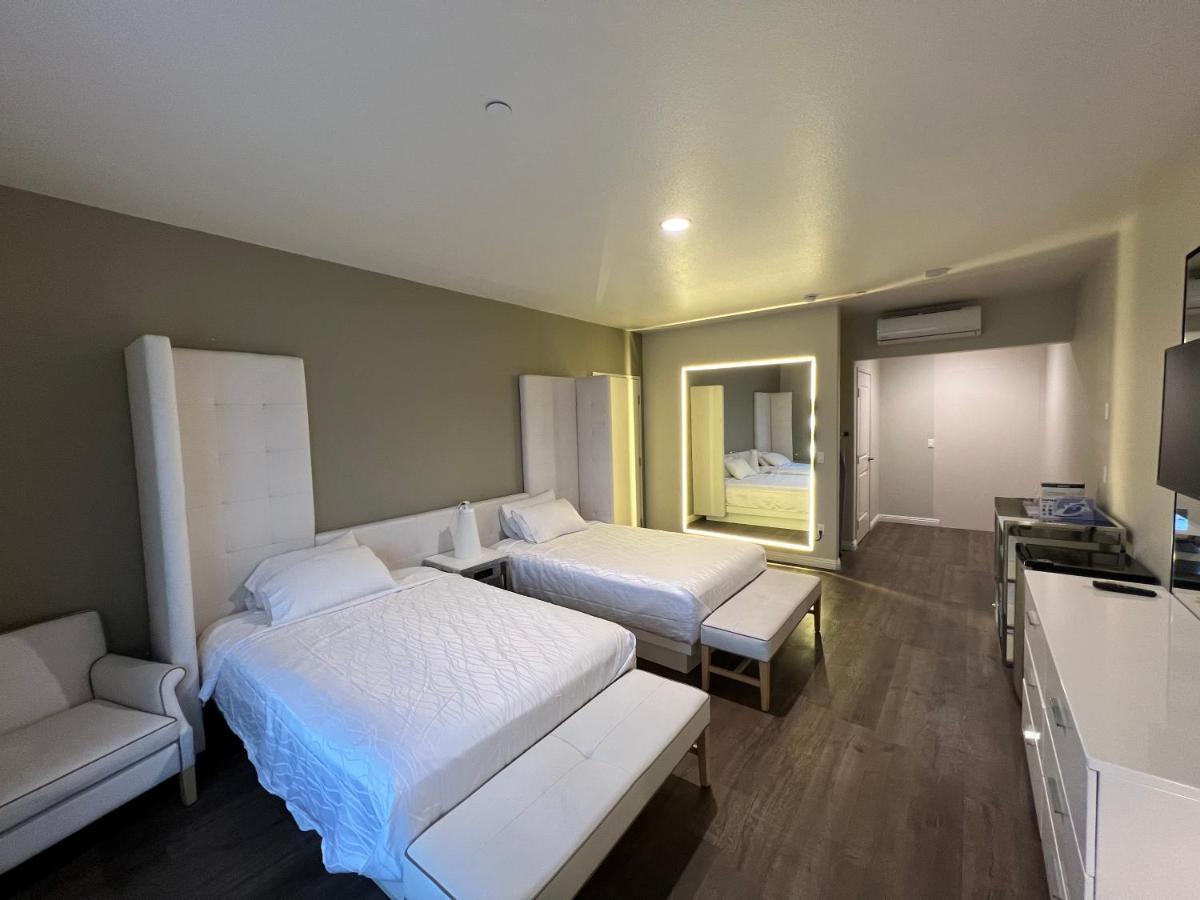 Aspire Inn & Suites Orange Bagian luar foto